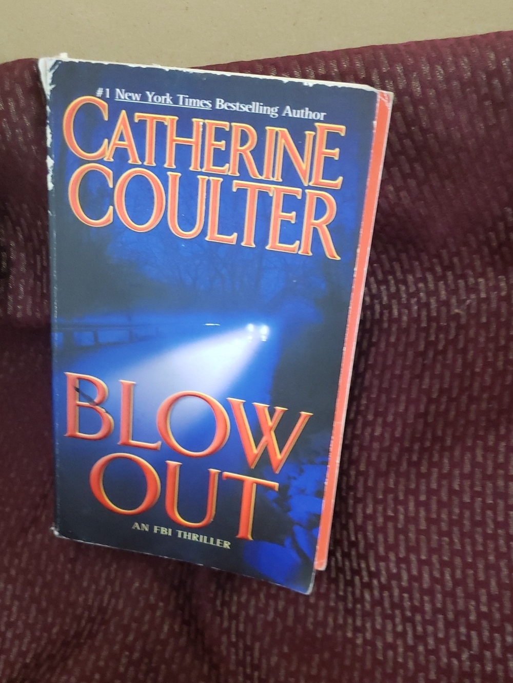 "Blow Out" Paperback Book - Blue & Maroon Cover